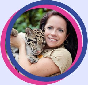 aimee stubbs holding a baby leopard