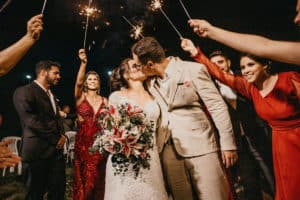 Man and Woman Kissing at their wedding