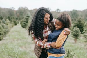 mother and daughter at tree farm