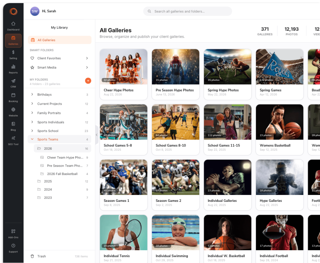 A digital dashboard displays a user's sports photography library, featuring a left-hand navigation sidebar and a main grid of gallery folders with thumbnail images of cheerleaders, football, basketball, tennis, and swimming.